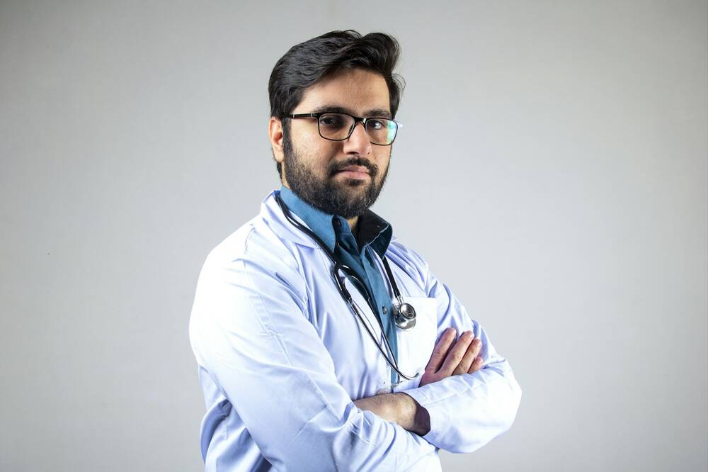 Hospital doctor in a white coat